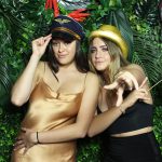 Digital photo booth rental green flower wall rental with girls posing
